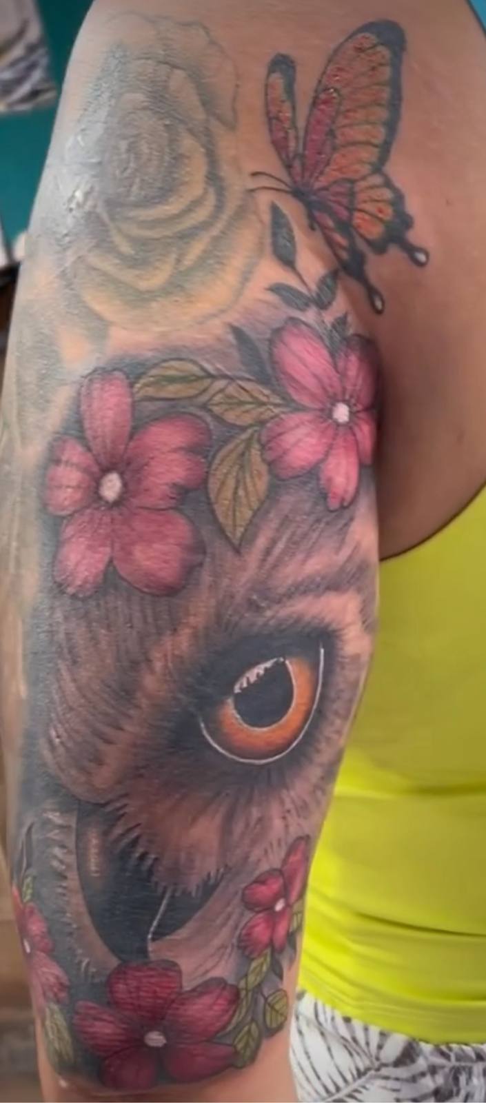 Owl butterfly and flowers arm tattoo by Marcelo Tattoos Bronx