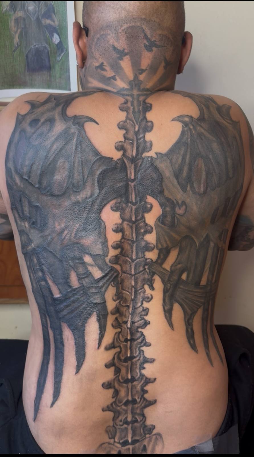 Full back spine and demon wings tattoo by Marcelo Tattoos Bronx